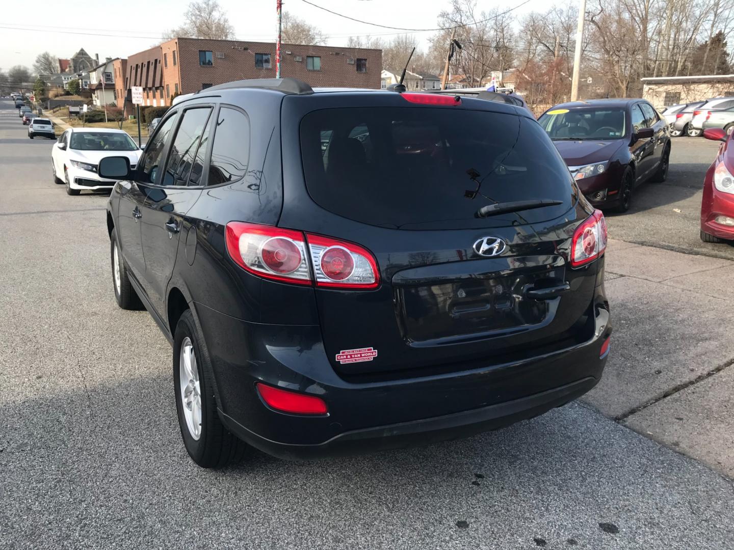 2011 Blue /Gray Hyundai Santa Fe GLS (5XYZGDAB5BG) with an 2.4 V4 engine, Automatic transmission, located at 577 Chester Pike, Prospect Park, PA, 19076, (610) 237-1015, 39.886154, -75.302338 - Photo#5